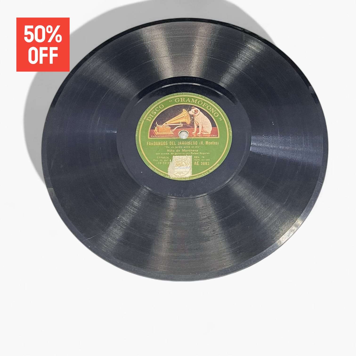 Disco de pizarra antiguo con etiqueta verde de Gramófono, Fandangos del Jardinero de H. Montes, ideal para decoración nostálgica.
