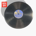Disco de pizarra antiguo con grabación de Milonga, sello Odeon azul, ideal para decoración vintage de hogar o colección.