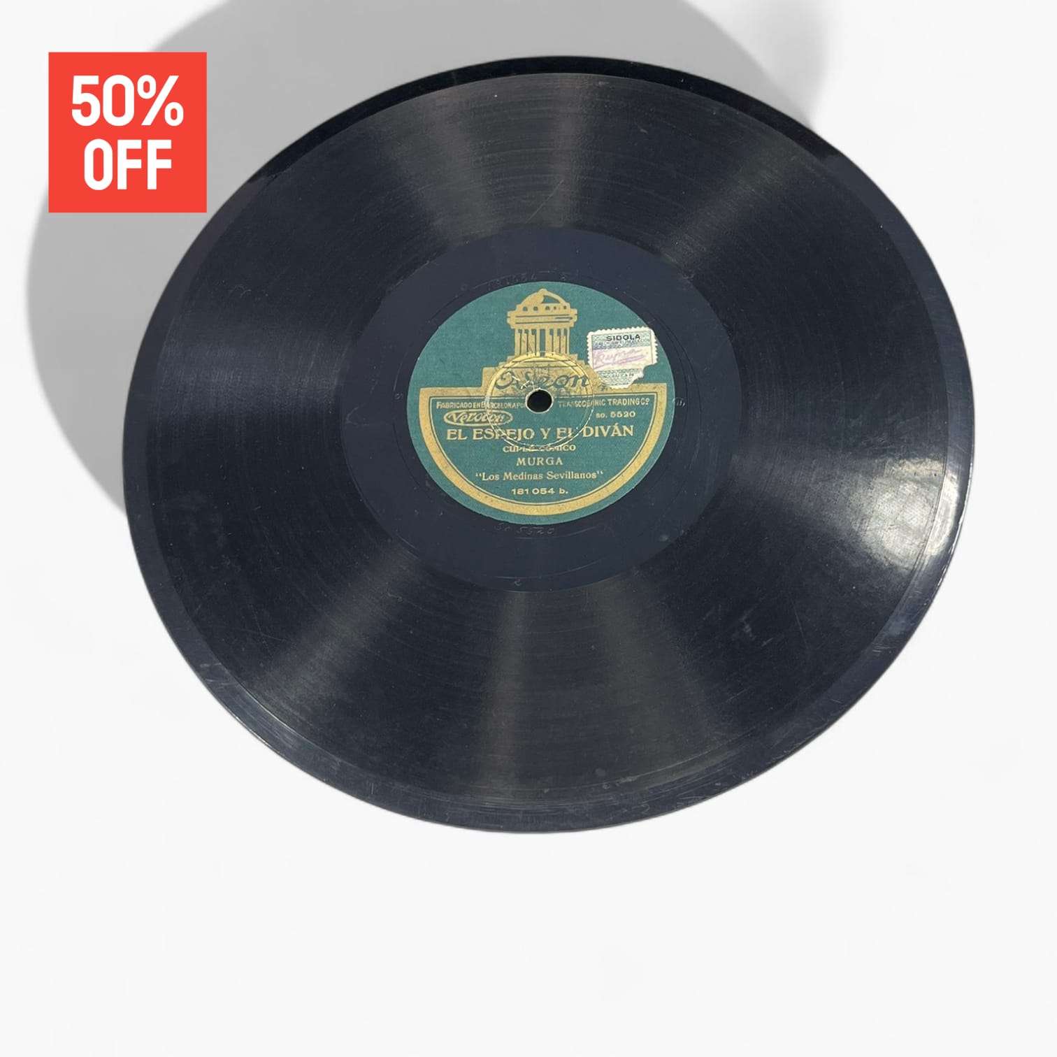 Disco de pizarra con etiqueta verde de Odeon, grabación El Espejo y el Diván, parte del lote de 10 discos únicos en promoción.