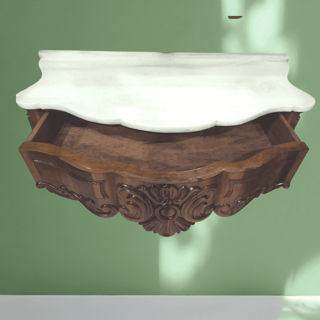 Consola de mármol suspendida de pared con tapa blanca y estructura de caoba tallada, ideal para decoración elegante en interiores.