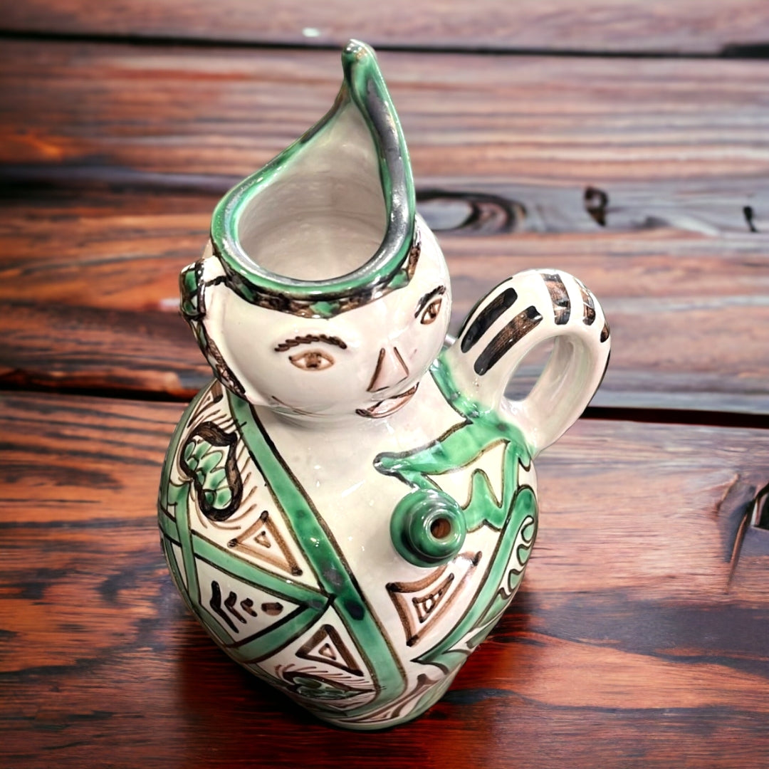 Botijo Cachirulo de cerámica con diseño tradicional en tonos verdes y marrones. Perfecto para decoración rústica y amantes de la artesanía.
