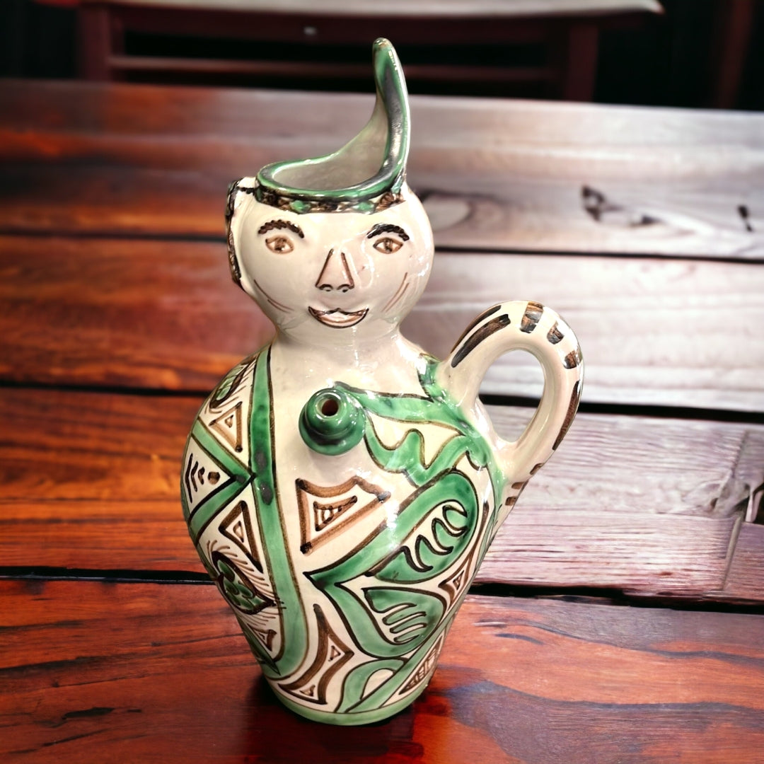 Botijo Cachirulo de cerámica con diseño tradicional en tonos verdes y marrones. Perfecto para decoración rústica y amantes de la artesanía.