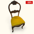 Silla individual Isabelina de caoba tallada con elegante terciopelo amarillo.