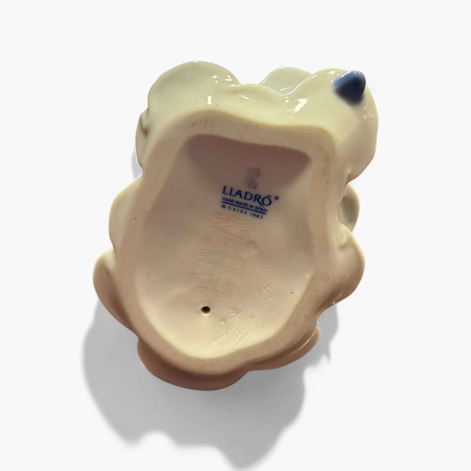 Base de la figura Lladró Bailaorita Brazos Abajo 1983 con sello original en porcelana, pieza de colección para decoración de interiores.