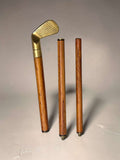 Tal y como se observa en las imágenes, presenta una vara de madera de tono cálido con veta visible, rematada por discretas anillas oscuras decorativas que aportan ritmo visual al conjunto. La parte superior, en bronce, ofrece