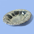 Panera antigua de metal plateado decorativa para mesa y hogar