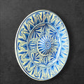 Platos decorativos de cerámica pintados a mano en azul y blanco