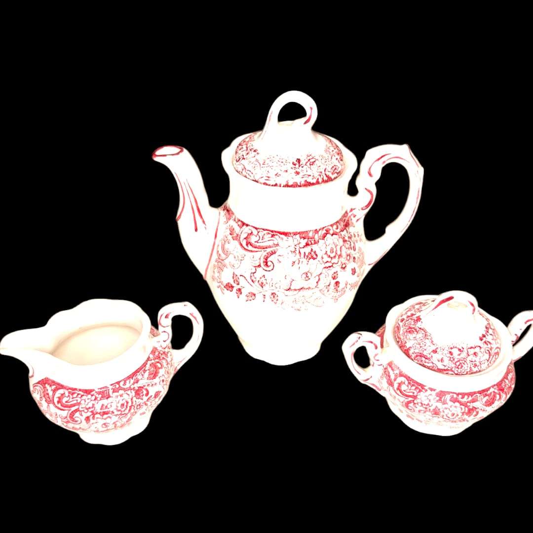 Juego de café La Cartuja Pickman en loza roja
