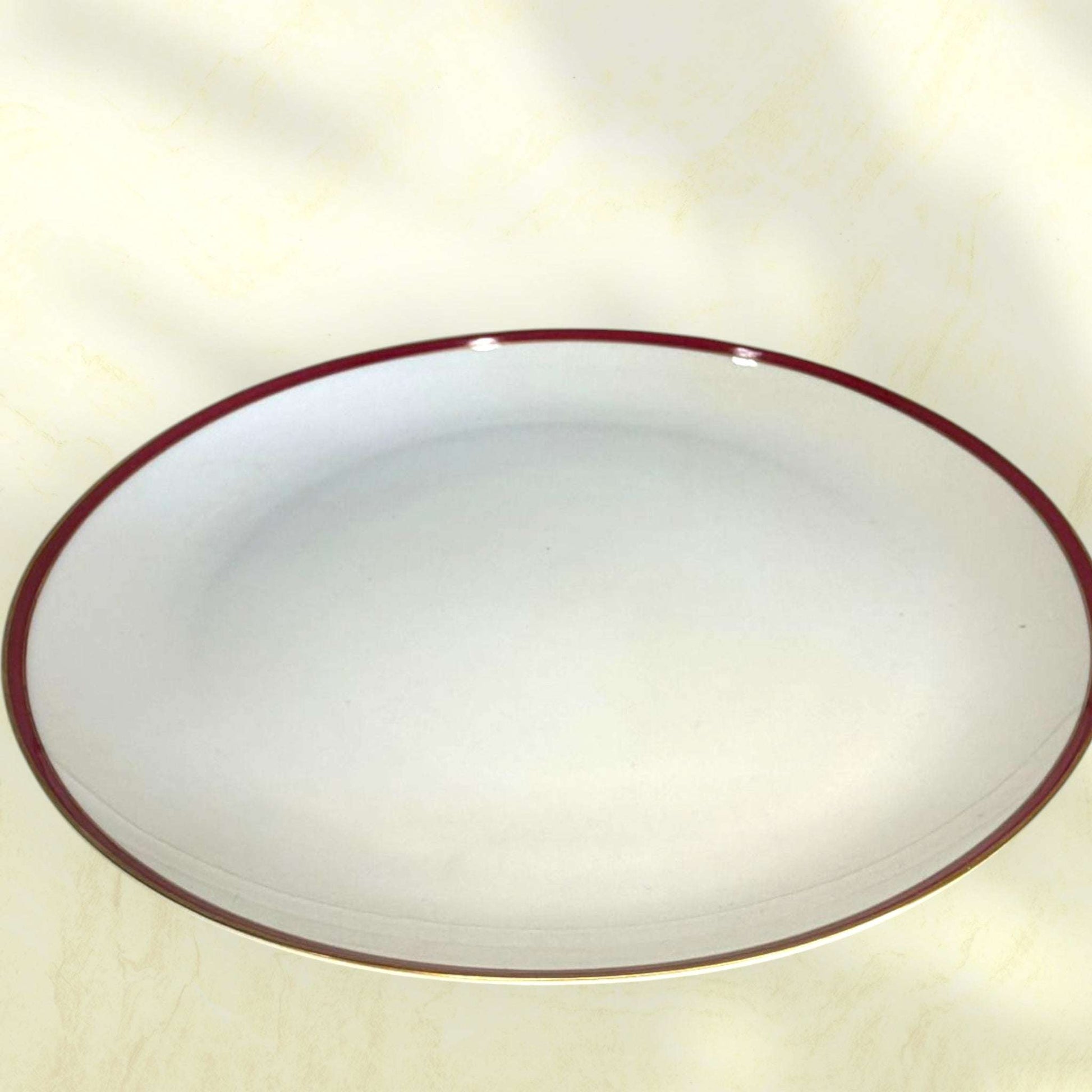 Resto vajilla porcelana española con borde granate