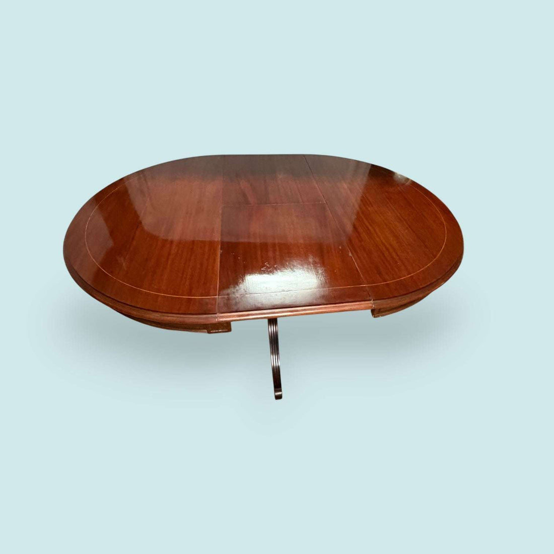 Mesa extensible de caoba con taracea para comedor
