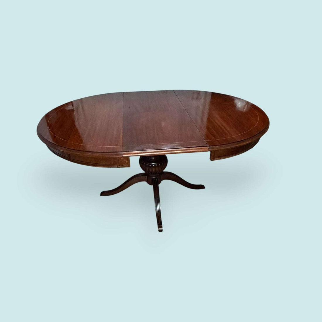 Mesa extensible de caoba con taracea para comedor