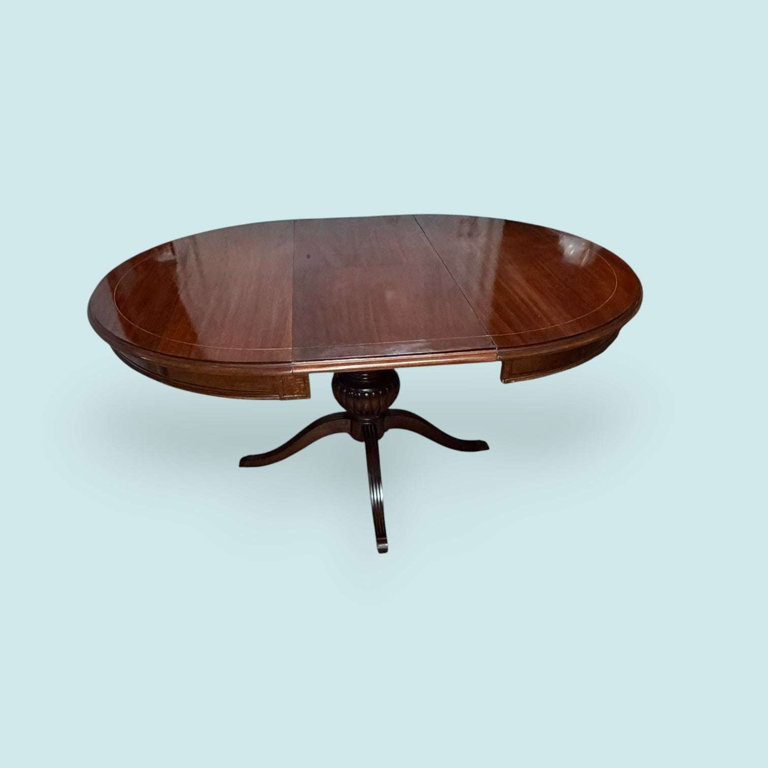 Mesa extensible de caoba con taracea para comedor