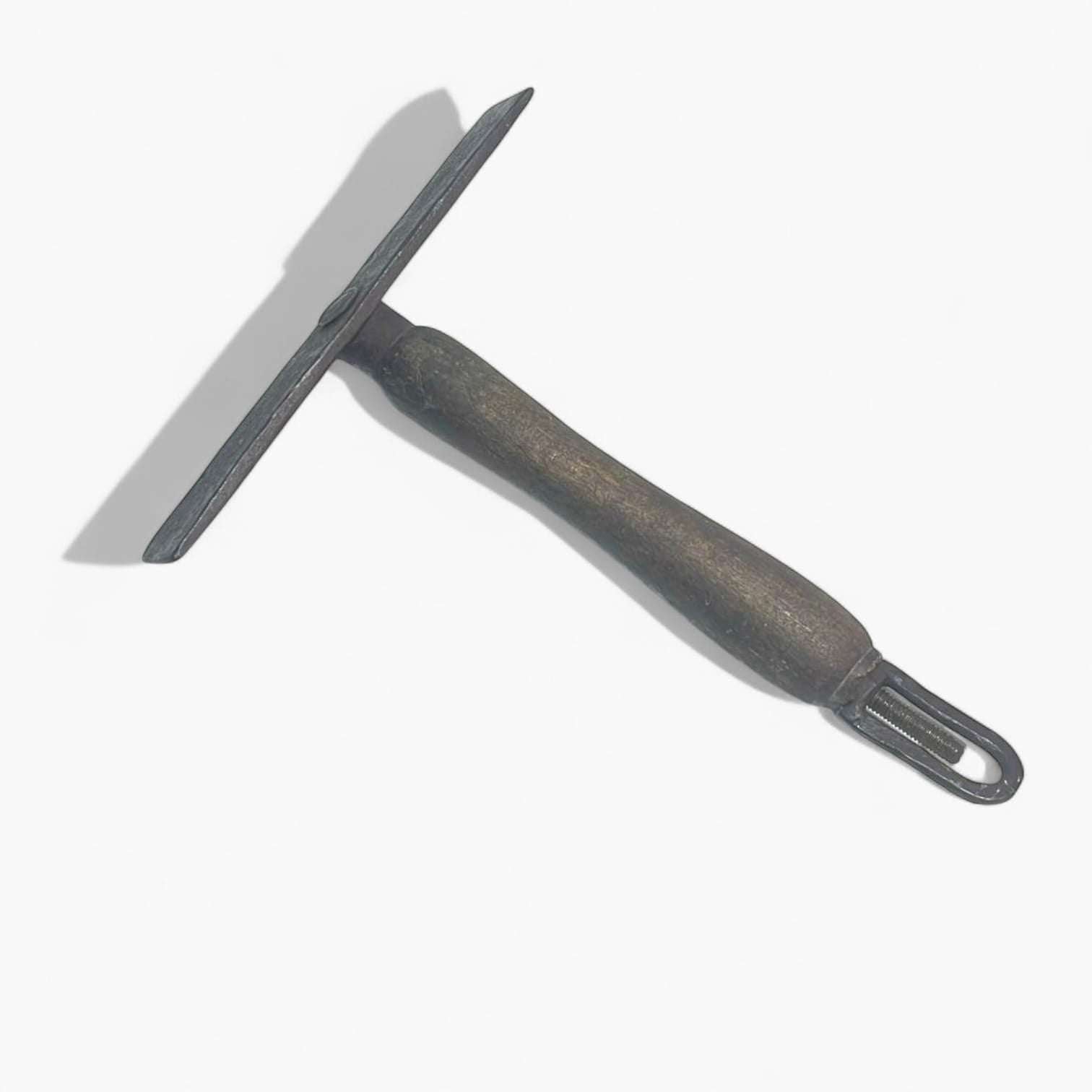 Detalle del cabezal en forma de T de la alcotana antigua.