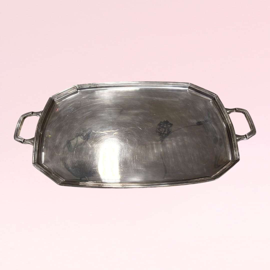 Gran bandeja de metal plateado con cristal protector vista frontal.