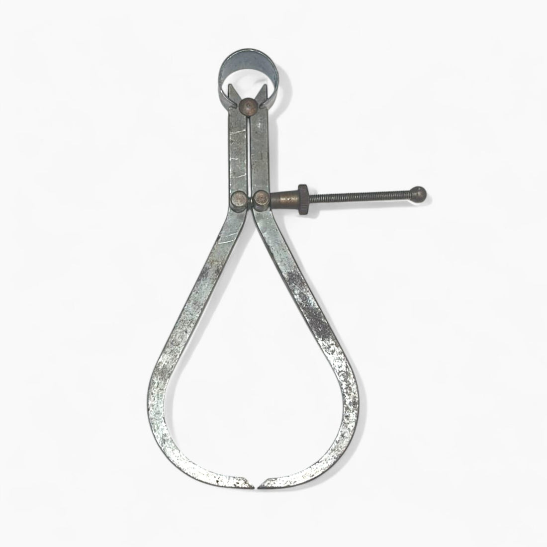 Galga antigua de metal con tornillo de ajuste micrométrico.