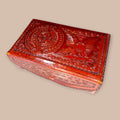 Joyero de cuero con relieves tipo calendario azteca, diseño artesanal con águila y símbolos prehispánicos. Ideal para decoración vintage y coleccionistas.