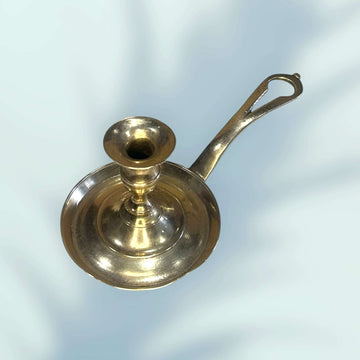 Palmatoria antigua de metal dorado vista superior