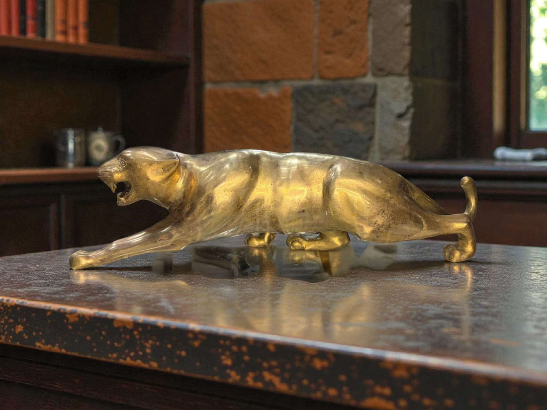 Pantera de metal dorado decorativa de gran tamaño