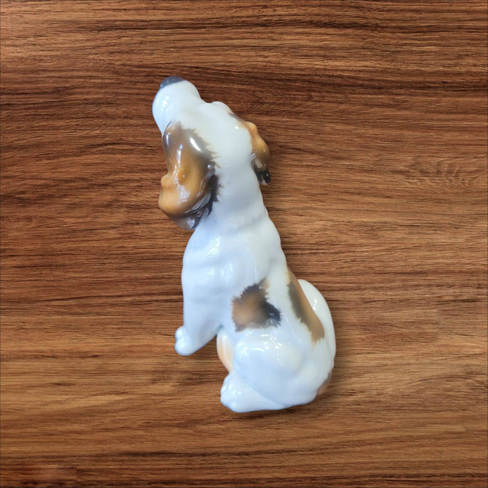 Figura lateral de perro en porcelana alemana original Limbach años 50, diseño detallado ideal para decoración vintage y coleccionistas.