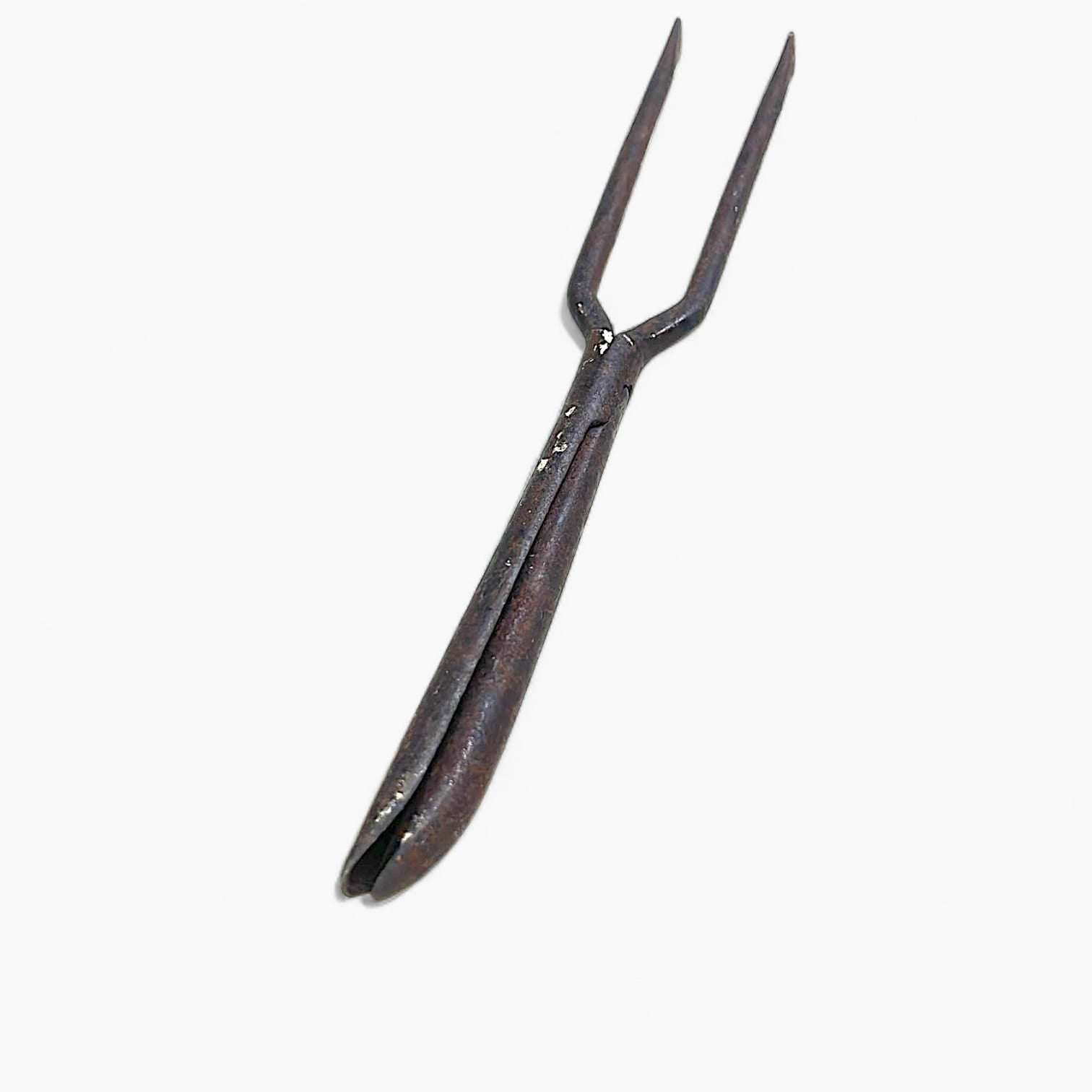 Tijera antigua para tirabuzones o encañonar de hierro forjado.