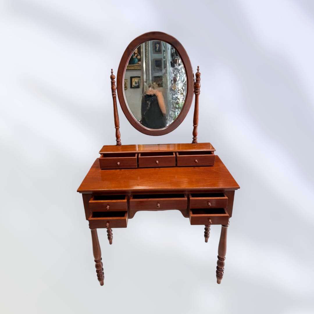 Tocador de caoba completo con patas torneadas y espejo.