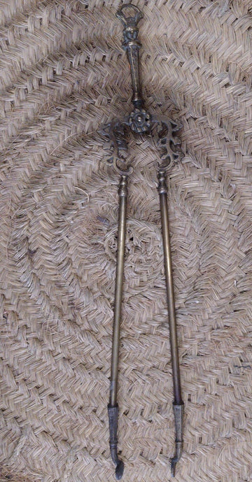 Kaminzange aus Bronze
