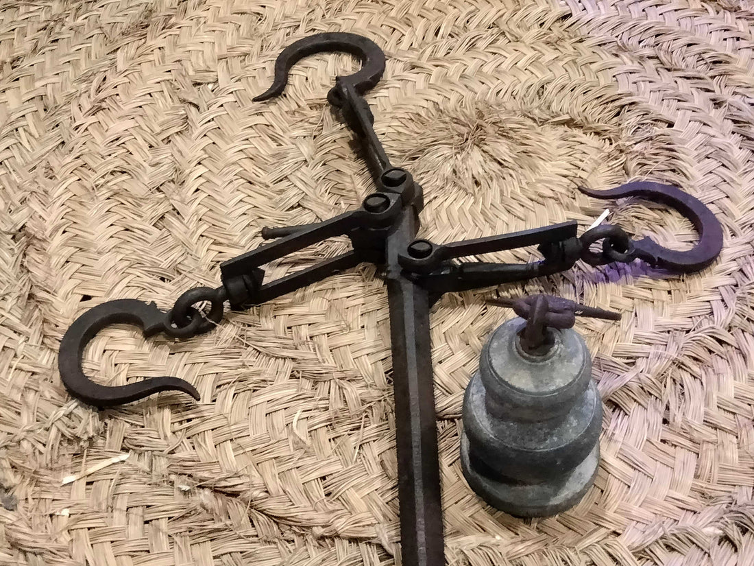 Romana antigua de 55 kilos con pilón de plomo