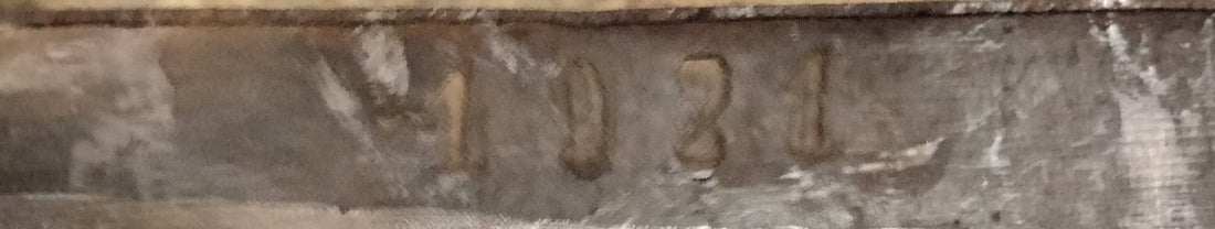 Cuartilla Centenaria de madera de 1921 con capacidad de 13,87L, usada para medir granos. Pieza rústica ideal para decoración vintage.